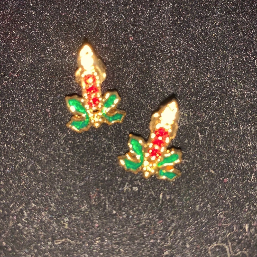 A set of Candles burning in a bed of ivy earrings